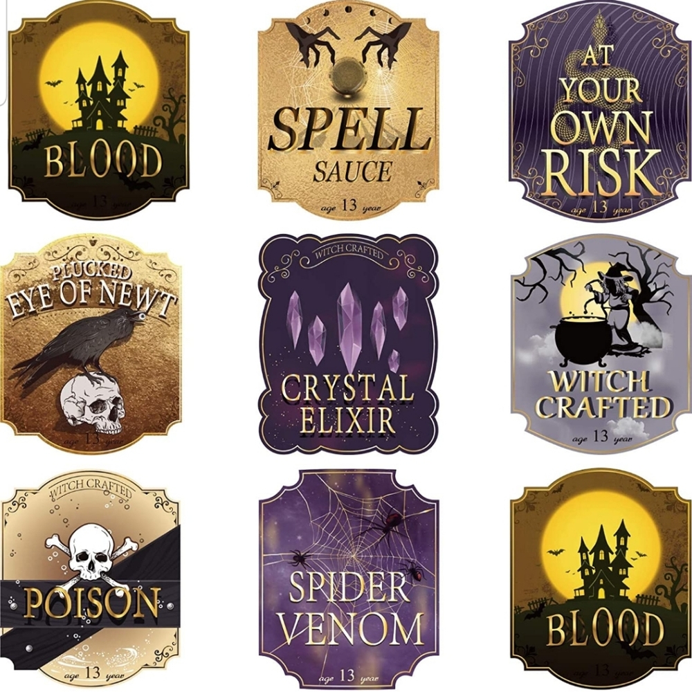 Halloween wine bottles with fairy lights and flickering candle flame topper